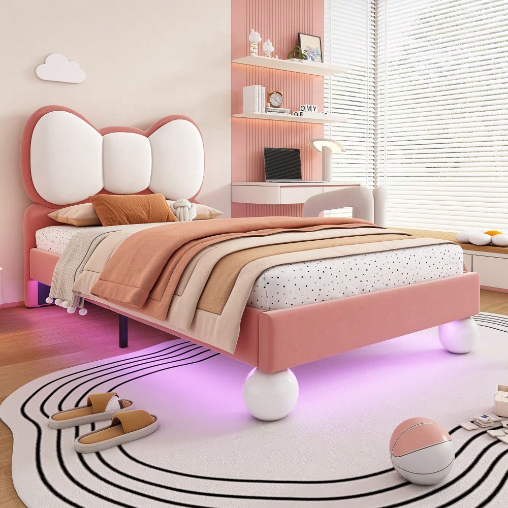 Polsterbett, Einzelbett, Kinderbett, Fliegeformiges Bettkopfteil, Farblich anpassbare LED-Lichtleiste unter dem Bett, stabiler Lattenrost, Samt, schönes Design, Beige + Rosa, 90x200cm
