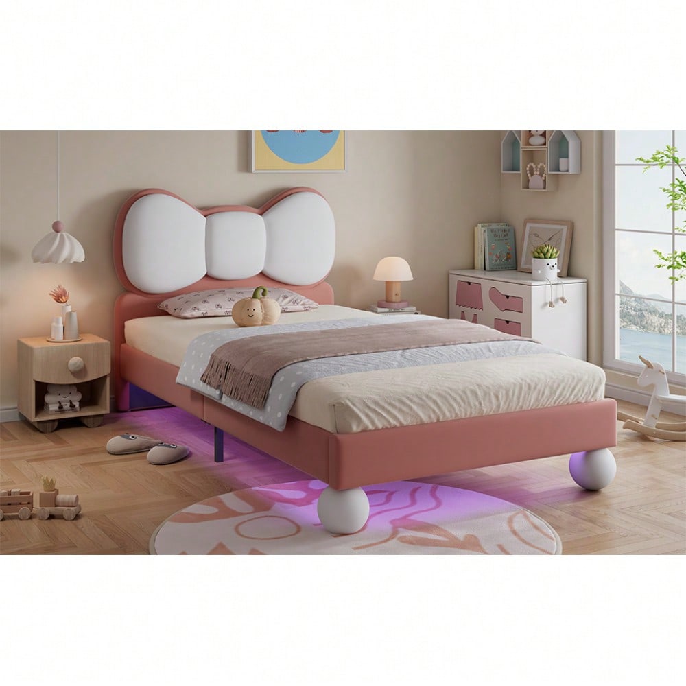 Polsterbett, Einzelbett, Kinderbett, Fliegeformiges Bettkopfteil, Farblich anpassbare LED-Lichtleiste unter dem Bett, stabiler Lattenrost, Samt, schönes Design, Beige + Rosa, 90x200cm
