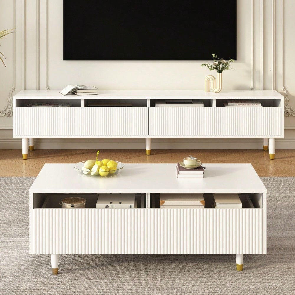 Dieser moderne LED-Couchtisch verfügt über eine gewellte Schubladenplatte, gold-weiße Beine, zwei Schubladen und einen farbwechselnden LED-Lichtstreifen. Ein passender TV-Schrank ist ebenfalls erhältl