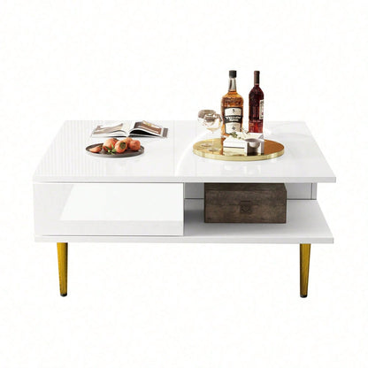 Quadratischer Couchtisch in Hochglanz Weiß mit zwei Schubladen, zwei offenen Fächern und goldfarbenen Beinen – 70 x 70 x 36 cm – Belastbar bis 30 kg