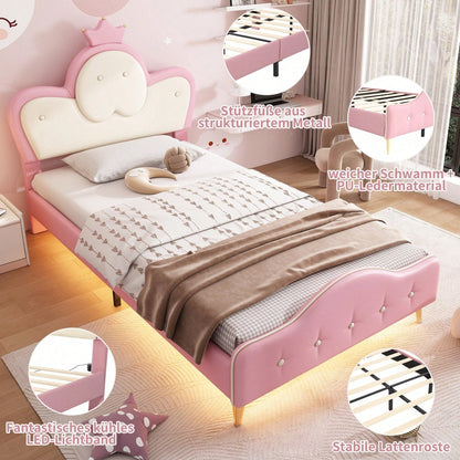 Polsterbett, Kinderbett, mit weichen Schutzkanten, Monochromer LED-Streifen, Kopfteil mit Krone, ohne Matratze, Bettfüße aus Metall, Wellenform mit Zugpunkt am Kopfende des Bettes, Einzelbett, PU, Rosa+Weiß,90x200CM