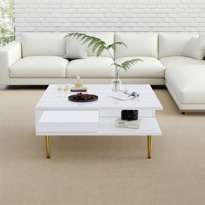 Quadratischer Couchtisch in Hochglanz Weiß mit zwei Schubladen, zwei offenen Fächern und goldfarbenen Beinen – 70 x 70 x 36 cm – Belastbar bis 30 kg