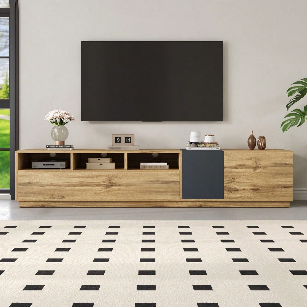 Ein moderner TV-Ständer in Kontrastfarben. Mit schlichtem, kontrastreichem Design. Mit offenen Fächern und Kabelöffnungen. 200 cm