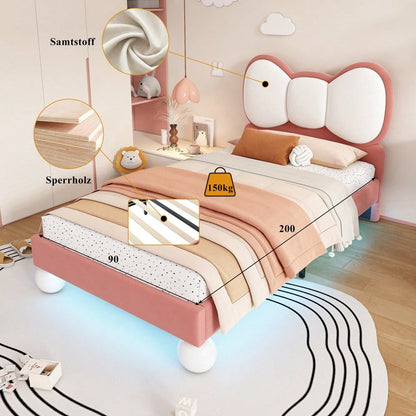 Polsterbett, Einzelbett, Kinderbett, Fliegeformiges Bettkopfteil, Farblich anpassbare LED-Lichtleiste unter dem Bett, stabiler Lattenrost, Samt, schönes Design, Beige + Rosa, 90x200cm