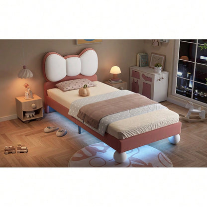Polsterbett, Einzelbett, Kinderbett, Fliegeformiges Bettkopfteil, Farblich anpassbare LED-Lichtleiste unter dem Bett, stabiler Lattenrost, Samt, schönes Design, Beige + Rosa, 90x200cm