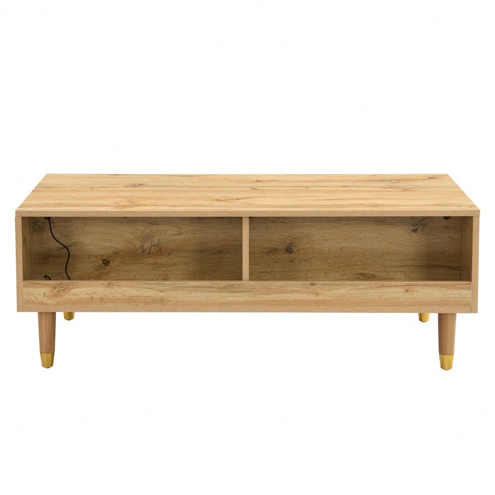 Dieser moderne LED-Couchtisch verfügt über eine gewellte Schubladenplatte, gold-holzfarbene Beine, zwei Schubladen und einen farbwechselnden LED-Lichtstreifen