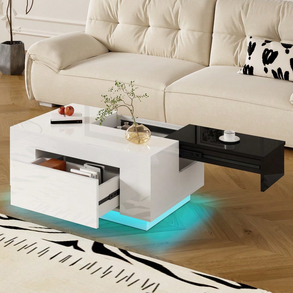 Hochglanz-Couchtisch mit LED-Beleuchtung, ausziehbarer schwarz-weißer Tischplatte, verstecktem Stauraum und 16-farbig einstellbarem Lichtband – die ideale Wahl für ein stilvolles Wohnzimmer