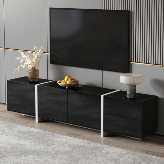TV-Ständer mit niedrigem Schrank, hochglänzend schwarzem Schrank mit kontrastierenden weißen Beinen sowie stilvollen Türen und Schubladen.Mit LED-Lichtleiste.