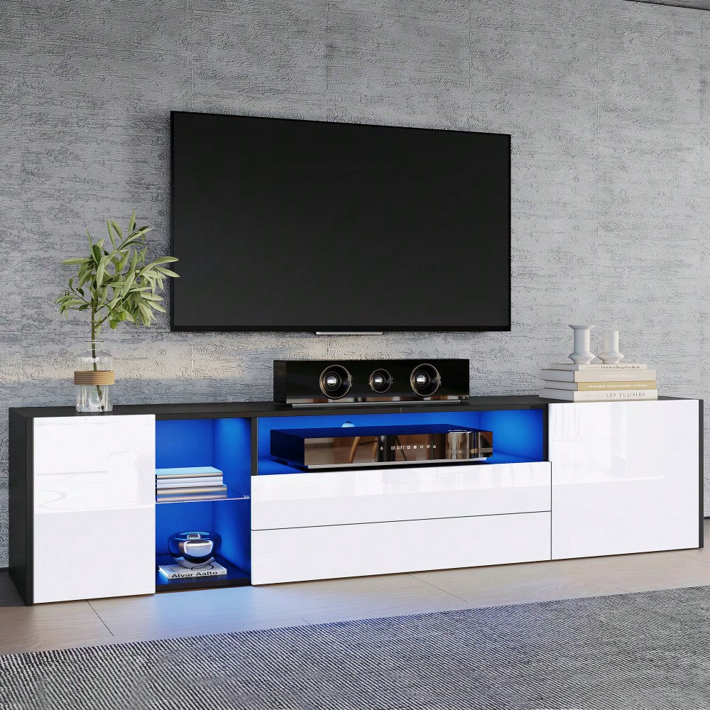180 x 40 x 45 cm TV-Standschrank, Hochglanz-LED-Lowboard-TV-Schrank, TV-Ständer mit 2 Schubladen und 2 Schränken, geeignet für 75-Zoll-Fernseher, schwarz-weißer Spleiß-TV-Schrank