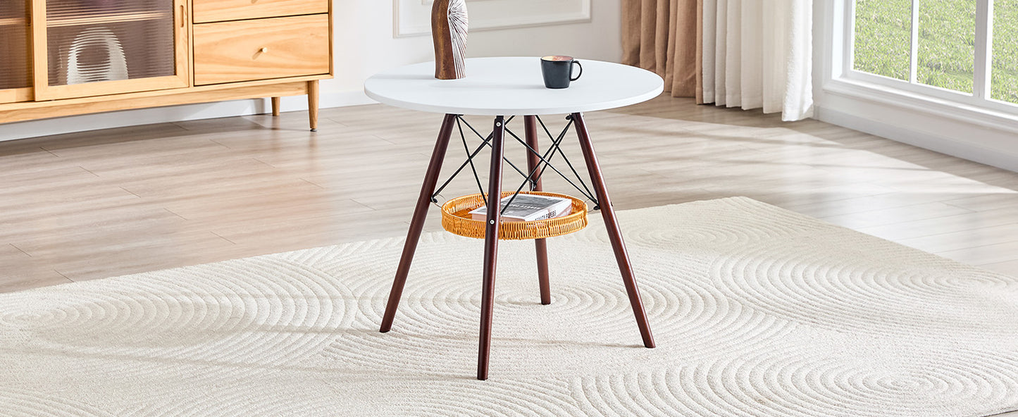 Runder Esstisch Ø 80 cm,Tischplatte aus weißem MDF, Tischbeine aus walnussfarbenem Massivholz, kombiniert mit einer schwebenden, geflochtenen Ablagekorbkonstruktion, geeignet für 2 bis 4 Personen.