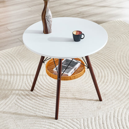 Runder Esstisch Ø 80 cm,Tischplatte aus weißem MDF, Tischbeine aus walnussfarbenem Massivholz, kombiniert mit einer schwebenden, geflochtenen Ablagekorbkonstruktion, geeignet für 2 bis 4 Personen.